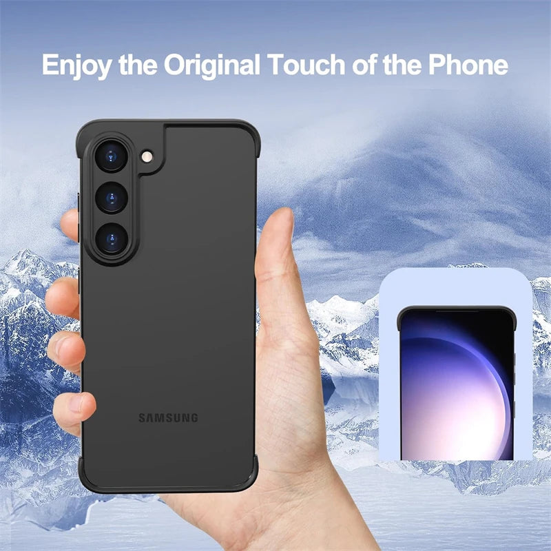 Hand holding a black Samsung phone case with mountainous background